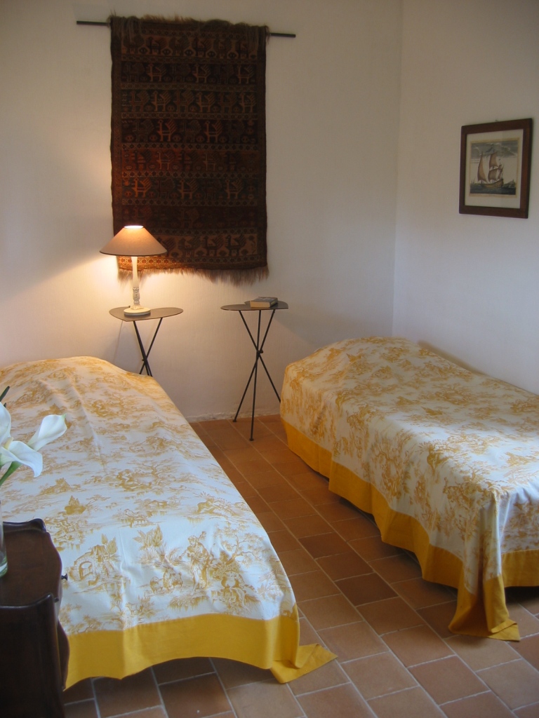 Holiday rental. The white room, on top of the tower, with a beautiful view over Périgord